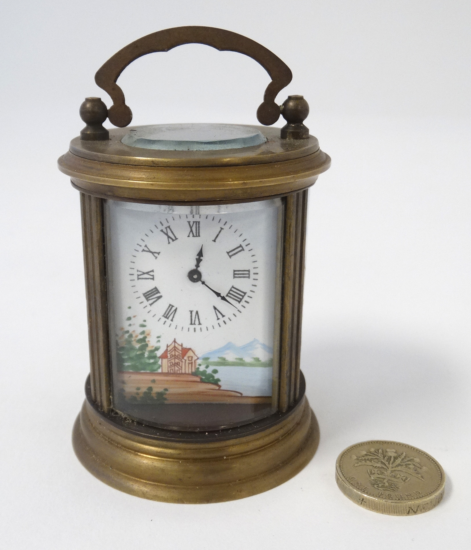 Miniature circular carriage clock ( timepiece ) : a 21st Century 3 bevelled glass and 2 hand