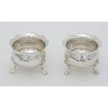 A pair of silver salts on three feet. Hallmarked Sheffield 1905 maker Lee & Wigfull .