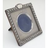 A silver photograph frame hallmarked Birmingham 1901 maker Henry Matthews.