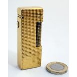 A mid-20thC Alfred Dunhill ' Rollagas ' Lighter , 9ct gold pyramid finish ,