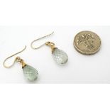 Yellow metal drop earrings set with facet cut semi-precious stone drops CONDITION:
