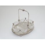 A silver plate and glass conserve cruet ,