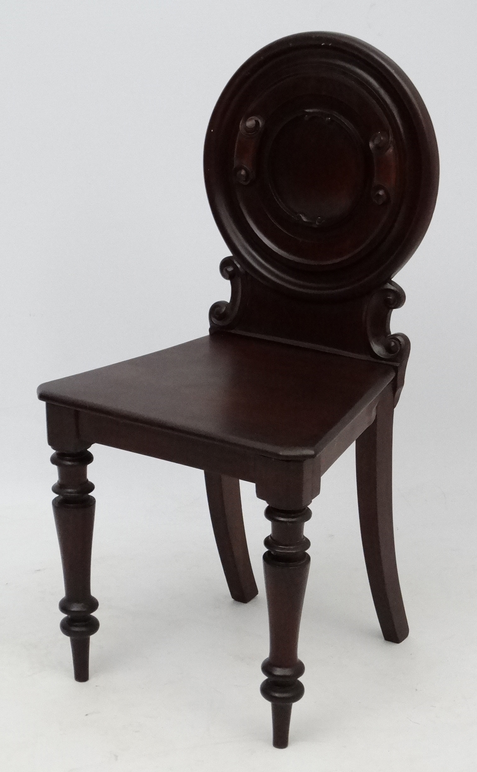 A Victorian plum coloured mahogany hall chair 33 1/2" high CONDITION: Please Note -