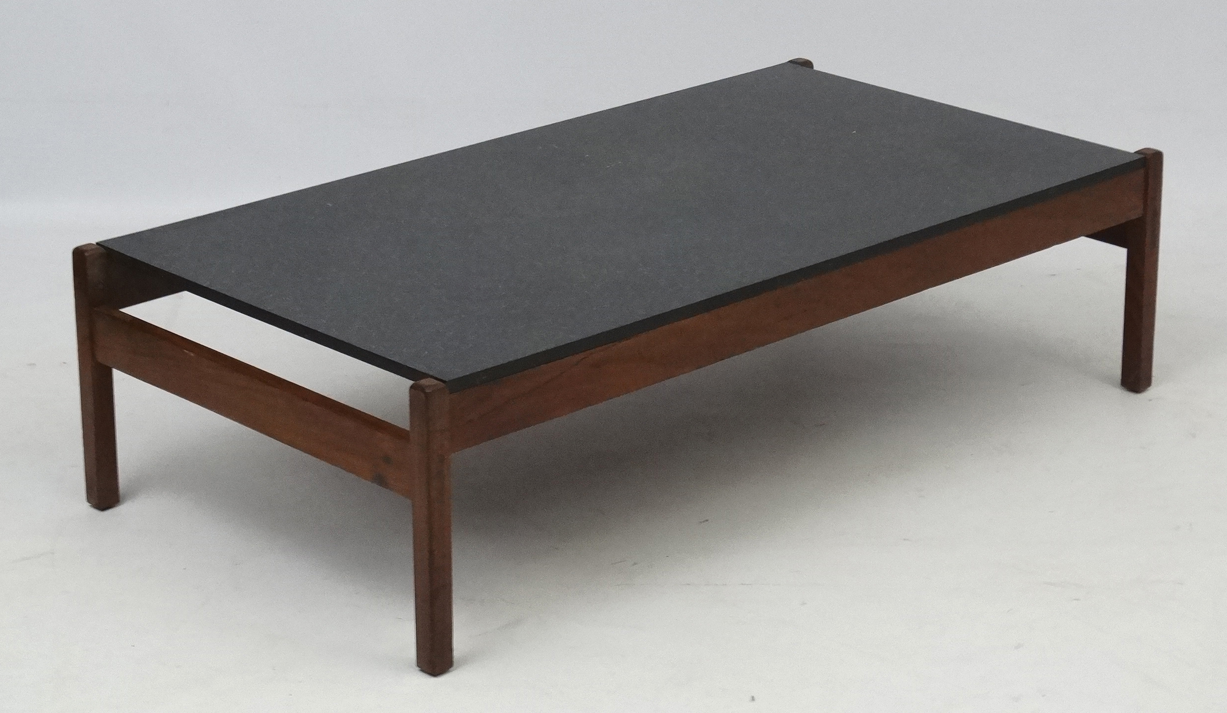 Vintage Retro: a low walnut and faux granite coffee table, measuring 46" long x 24" wide x 12" high.