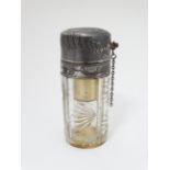 A cut glass atomizer bottle with silver plate screw top 4 1/4" high CONDITION: