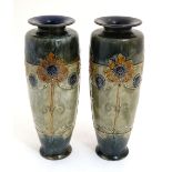 A large pair of Royal Doulton Art Nouveau Lambeth vases,