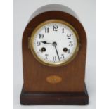 Junghans Arch cased mantle clock : an 8 day plated pendulum clock , striking on a coiled gong,
