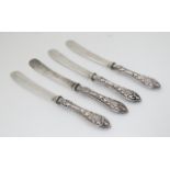 A set of 4 silver handled butter knife hallmarked Birmingham 1911 maker W J Myatt & Co 6 1/4" long