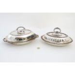 A silver plate entree dish together with an Old Sheffield plate serving / entree dish.