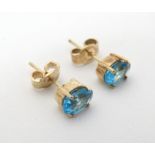 A pair of yellow metal stud earrings set with topaz CONDITION: Please Note - we do