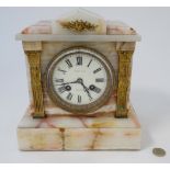 Tiffany Mantle Clock : an onyx cased and gilded applied adornments ,