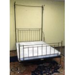 A Victorian brass and iron half tester / canopy bed, bears plaque for 'R.W.