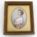 Manner of KPM , A hand painted miniature on oval cabochon porcelain base , depicting a noble lady,