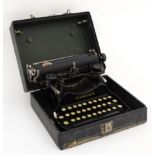 An early 20thC cased Corona ' 3 ' Typewriter , having a folding mechanism .