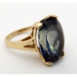A 14ct gold ring set with large oval Alexandrite stone 3/4" long CONDITION: Please