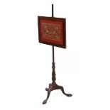 A 19thC mahogany tripod pole screen with needlework decoration marked MLS.