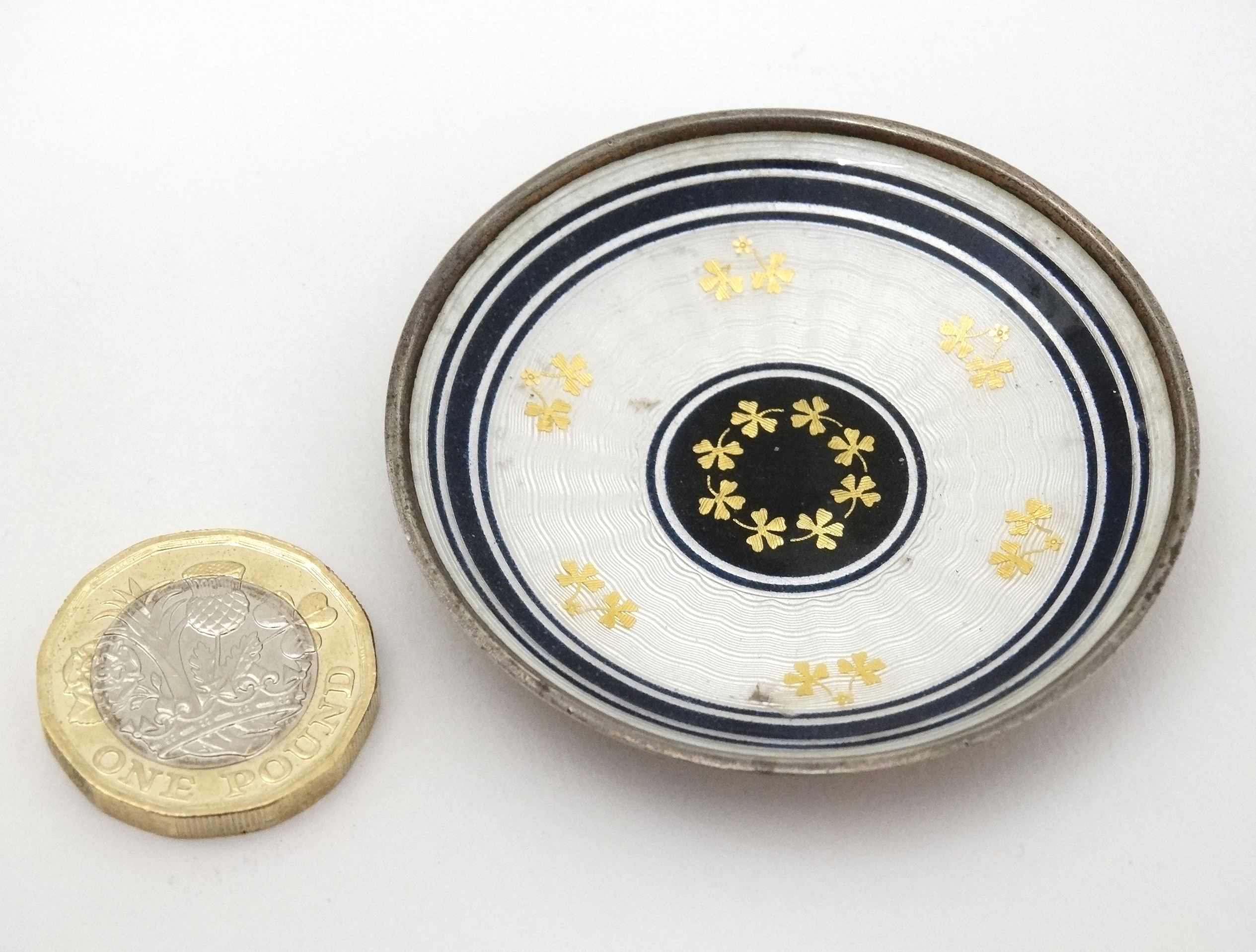 A Continental silver pin dish with guilloché enamel decoration 2 1/4" diameter.
