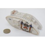 Militaria : Crestedware : A Carlton China model of a World War 1 mark IV tank ,