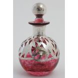 A Cranberry glass scent bottle with Britannia standard silver overlay hallmarked Sheffield 1997