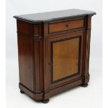 A 19thC Biedermeier style walnut and ebonised wood black marble topped side cabinet 39" high x 18