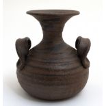 Scandinavian Pottery: A c1960s Nila Keramik studio pottery twin handled stoneware vase in brown