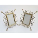 A pair of Victorian brass easel / strut photograph frames 6 1/2" high CONDITION: