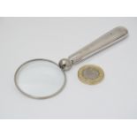 A silver handled magnifying glass 5" long overall CONDITION: Please Note - we do