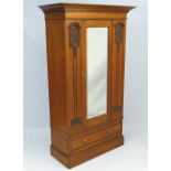 Art Nouveau : Art Nouveau : a circa 1900 Walnut ( near satin walnut ) single wardrobe with central