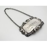 A silver wine label / bottle tag 'Sherry' hallmarked Sheffield 1966 maker Francis Howard Ltd.