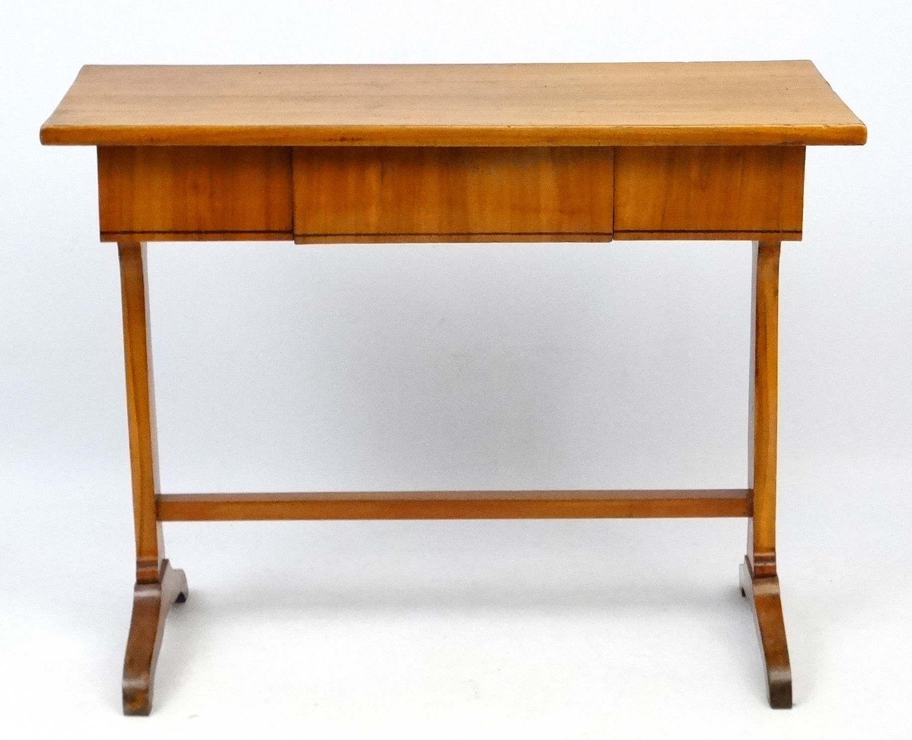 A c.1900 Cherry wood side table with ebony line inlay and frieze drawer.