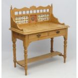 A Victorian stripped pine washstand with tile back and two frieze drawers 40" wide x 44 1/2" high x