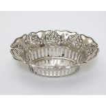 A silver bon bon dish with embossed and pierced decoration marked with RD no.