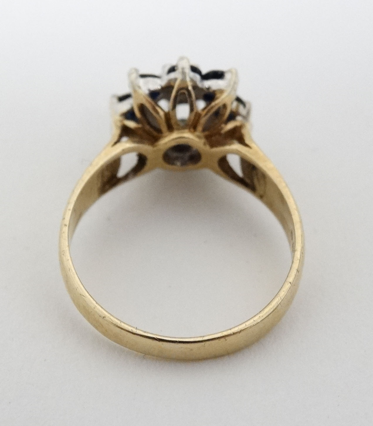 A 9ct gold ring set with central diamond bordered by blue stones CONDITION: Please - Image 3 of 3