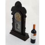 American Clock : ' Ansonia Clock Co ' a late 19thC ebonised 8 day 6" dial clock striking on a