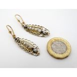 A pair of yellow metal drop earrings set with pearls 2" long CONDITION: Please Note