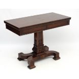 A late Regency Rosewood fold over pedestal tea table with drawers to either end 40" wide x 40" (