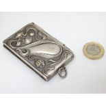 An Art Nouveau silver plated aide de memoire 3"high x 1 3/4" wide CONDITION: