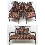 A Victorian mahogany cottage suite comprising sofa, 2 open armchairs,