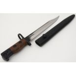 Militaria : A 1940s Wilkinson No 5 Mk1 knife Bayonet , early example having wooden grips ,