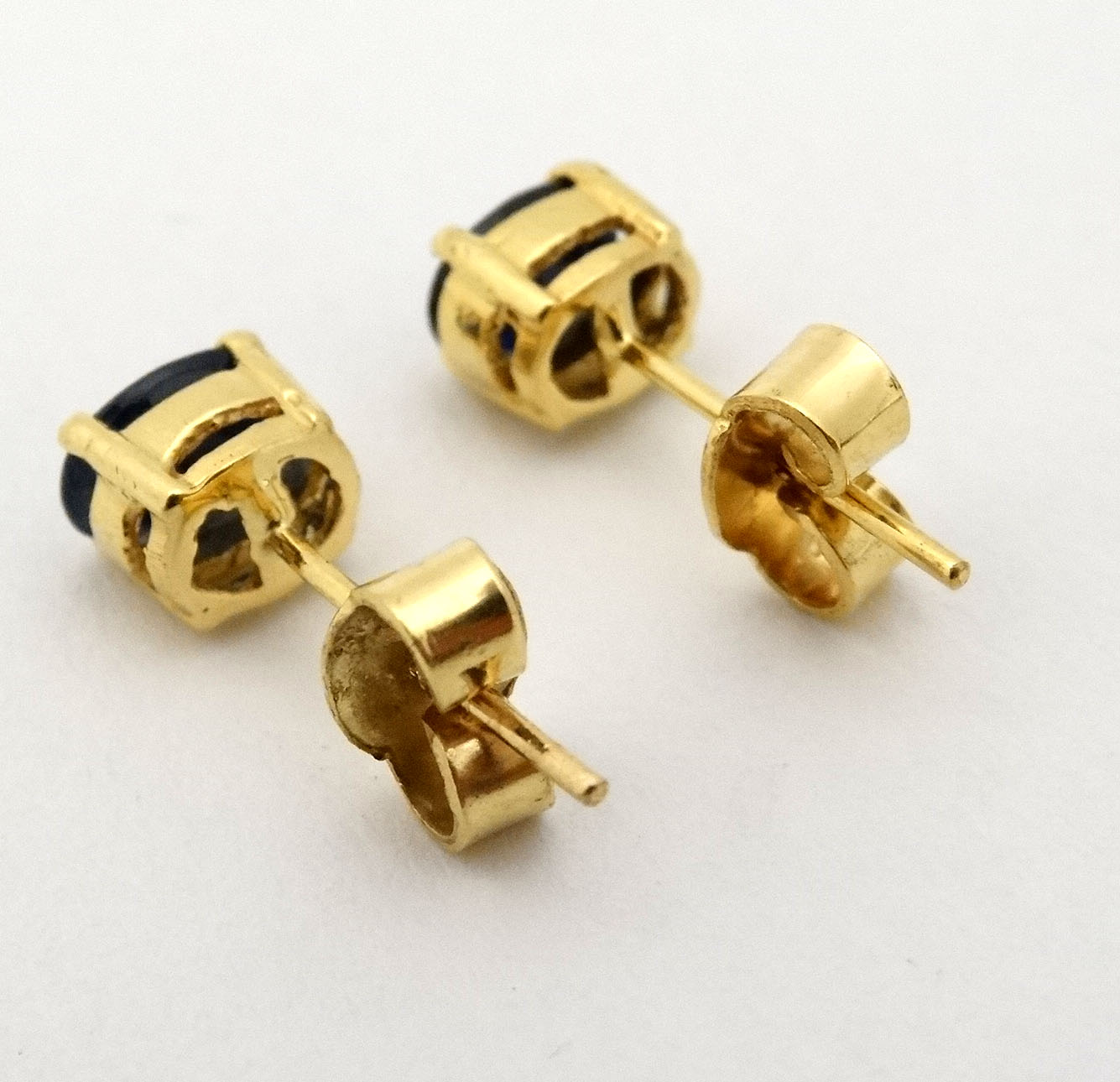 A pair of sapphire stud earrings with yellow metal mounts CONDITION: Please Note - - Image 2 of 3