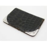 A green crocodile skin purse / wallet with calf skin lined interior and silver mounts hallmarked