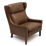 Vintage Retro : A Danish Wingback Lounge chair with brown leather upholstery in the Borge Mogensen