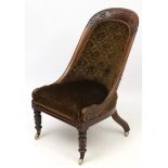 A William IV rosewood slipper chair with overstuffed seat and carved decoration 36 1/2" high
