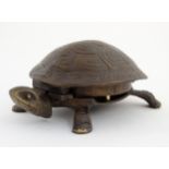 A 21st cast bronze novelty table top / counter / desk bell formed as a tortoise having hinged head