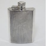 A silver plate hip flask of shaped form with engine turned decoration by James Dixon & Sons and