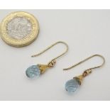 A pair of drop earrings set with facet topaz like stones CONDITION: Please Note -