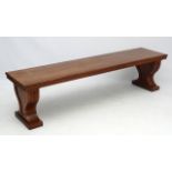 A 19thC manner of Gillows walnut bench 74 1/2" long x 18" wide x 19" high CONDITION: