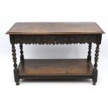 A 17thC / 18thC carved oak side table with bobbin turned supports,