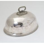 A late 19thC / early 20thC small proportion silver plate food cover of domed form with beaded