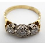 An 18ct gold ring set with trio of diamonds CONDITION: Please Note - we do not